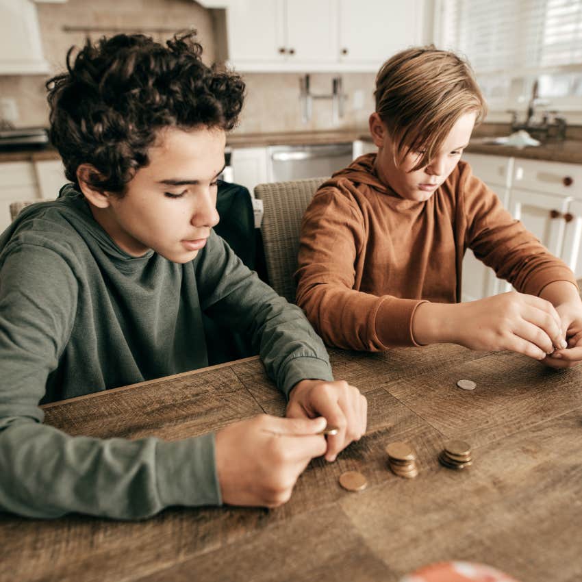 teen boys keeping track of their own money