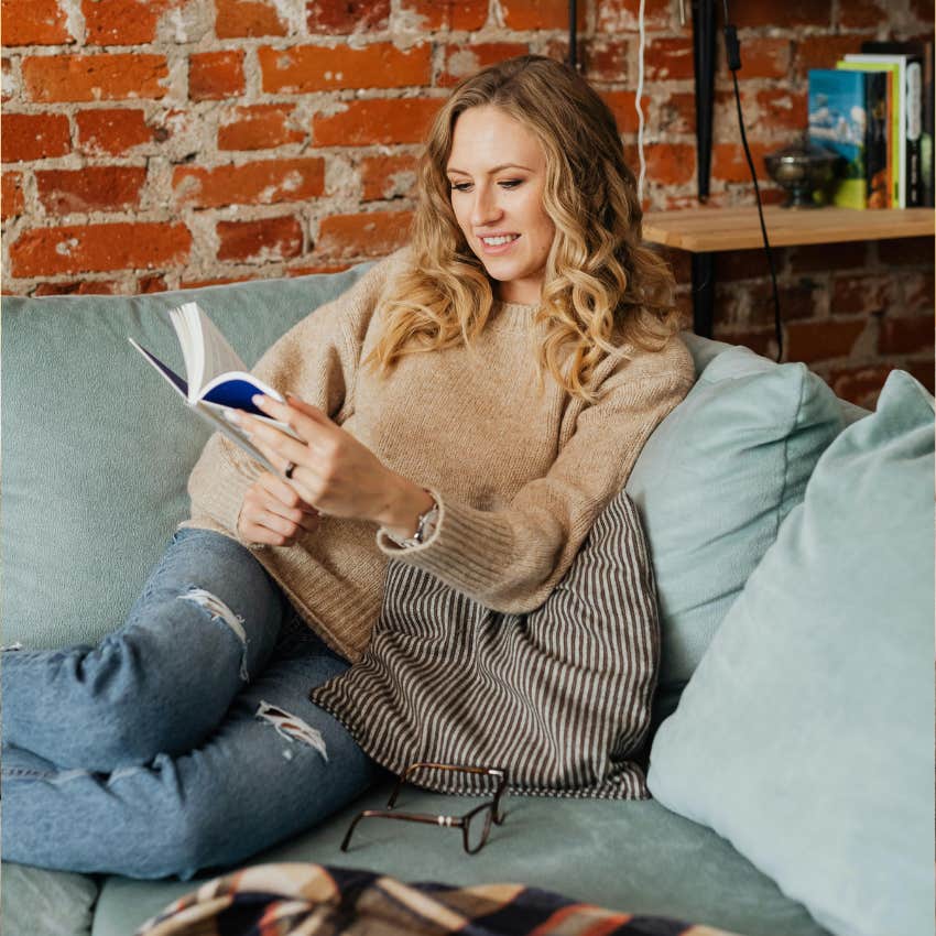 wealthy woman sitting on her comfy furniture