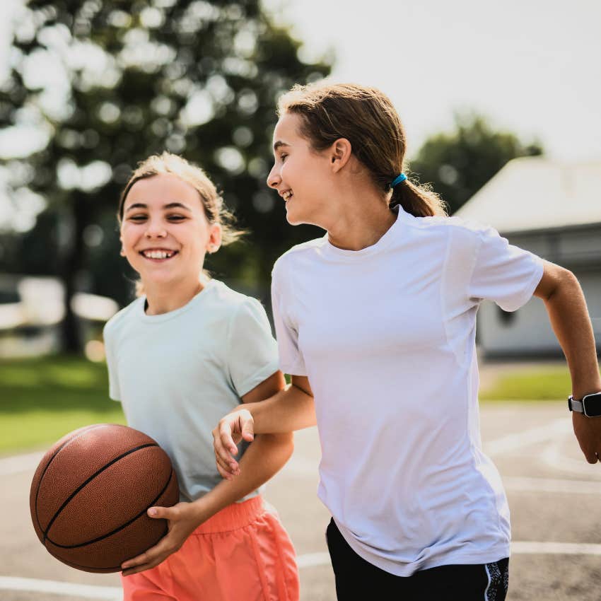 90s girls playing basketball outside with a free schedule