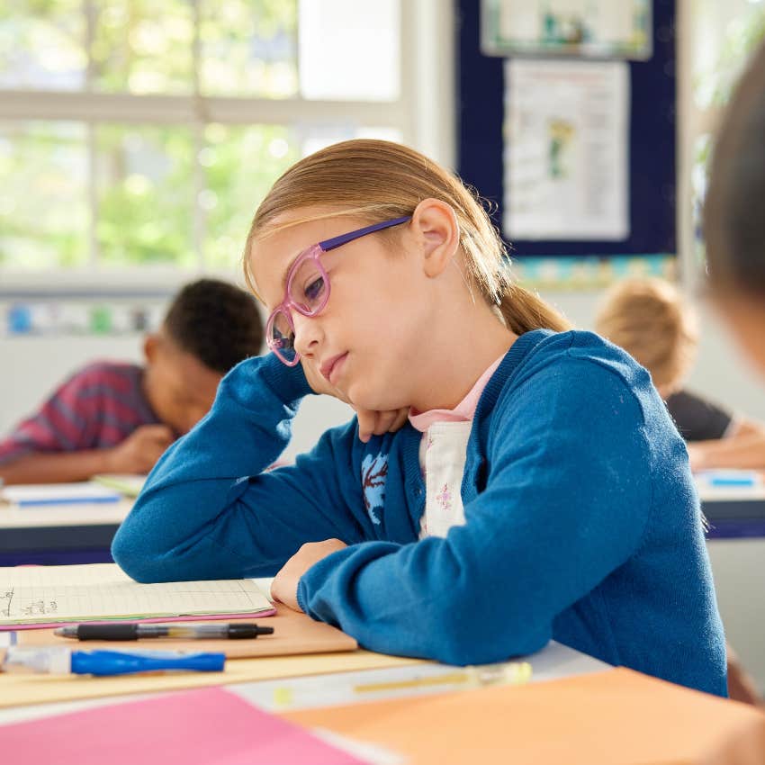 little girl in the classroom being allowed to make mistakes