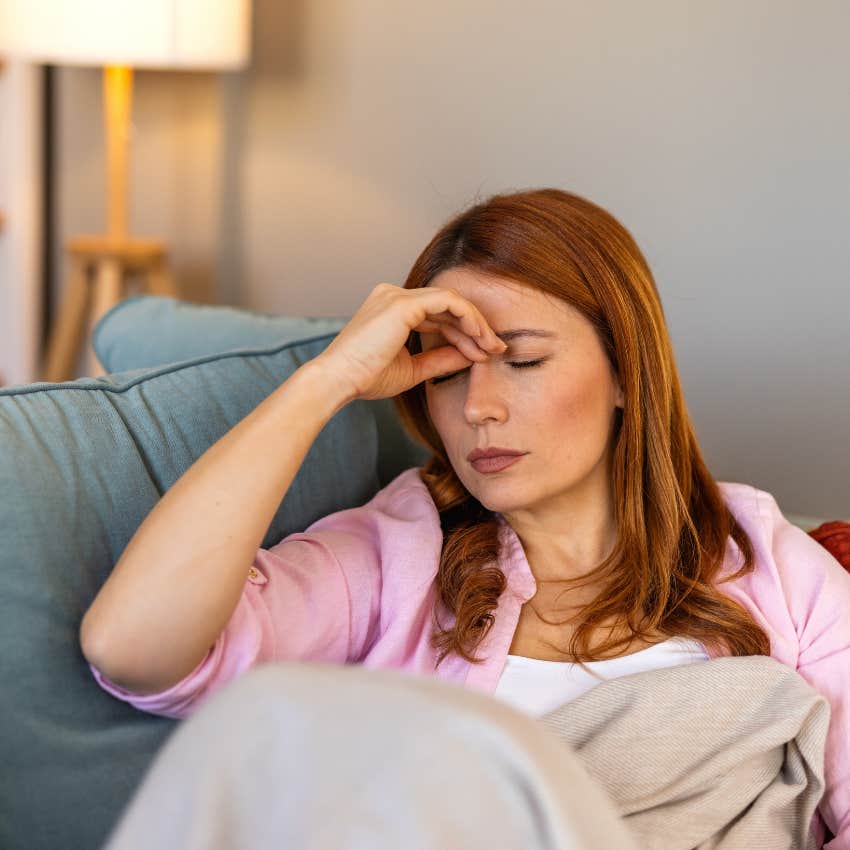 tired woman who is not ok she's just used to feeling bad