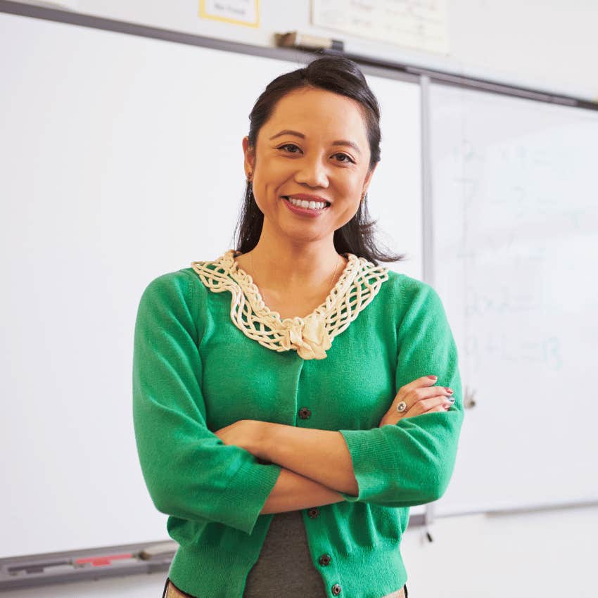 smiling teacher knowing how to smoothly run a classroom