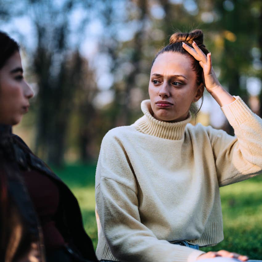 Woman pushing people away saying "I'm fine on my own." 