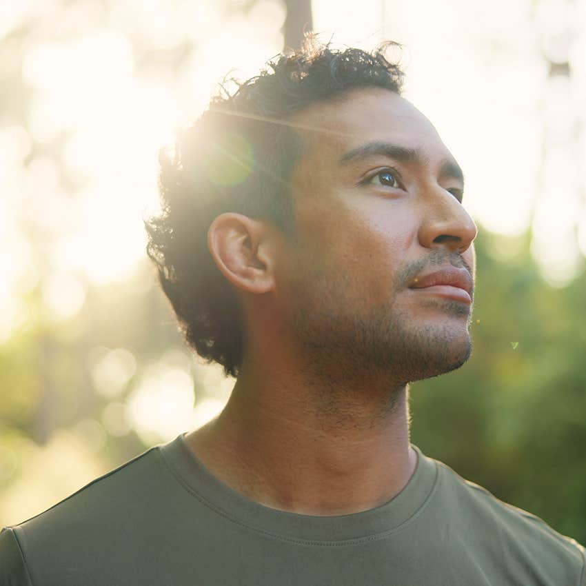 introspective man walking outside switching up his routine