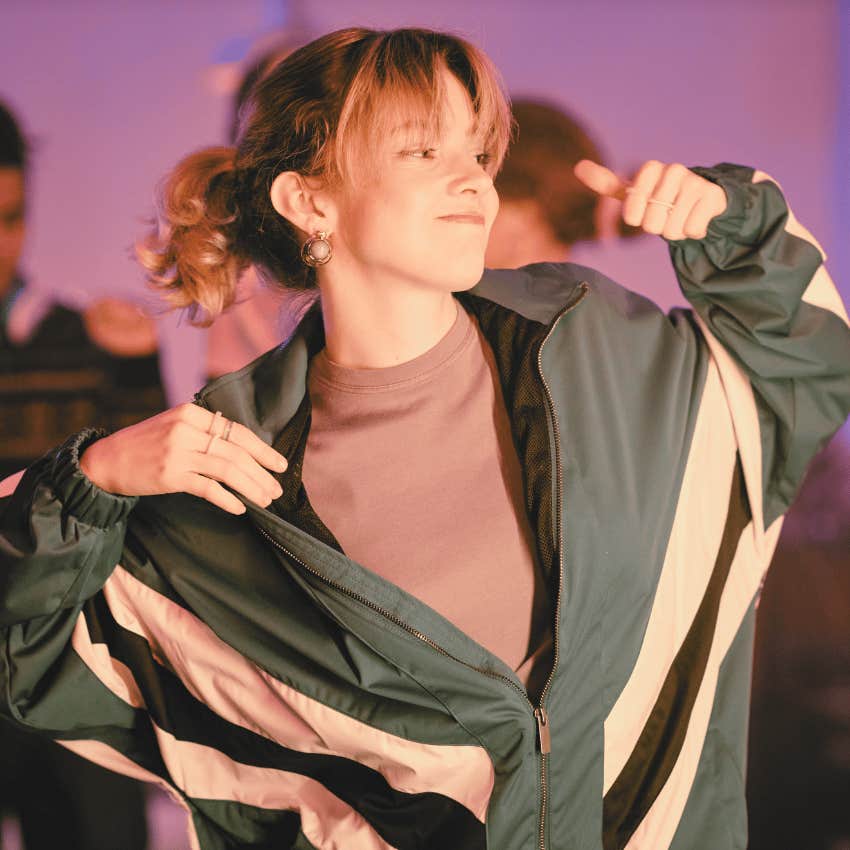 teen girl during an 80s style party dancing