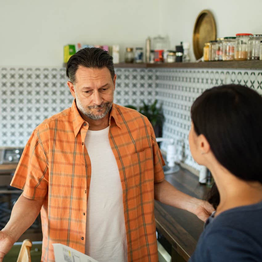 Man arguing about boundaries with his wife at home.