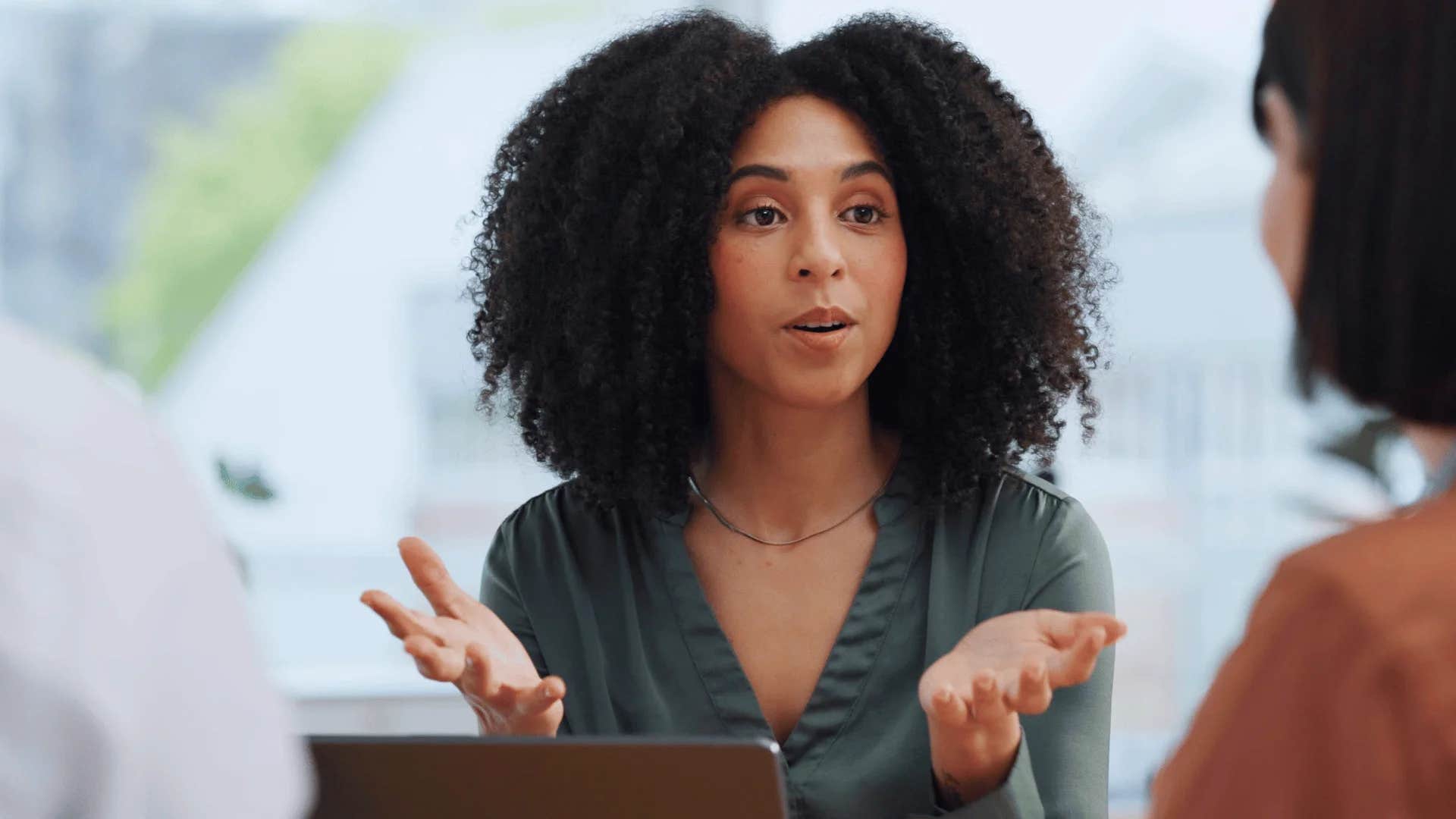 gen z woman setting boundaries with her older bosses