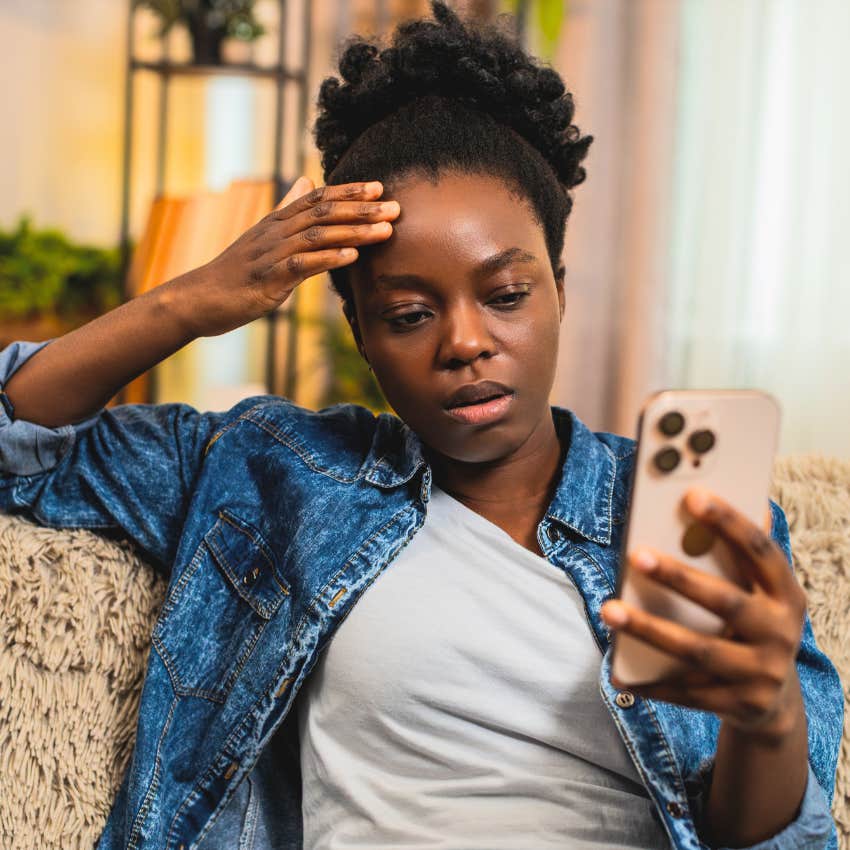 Gen Z woman going "no contact" with parents on her phone.
