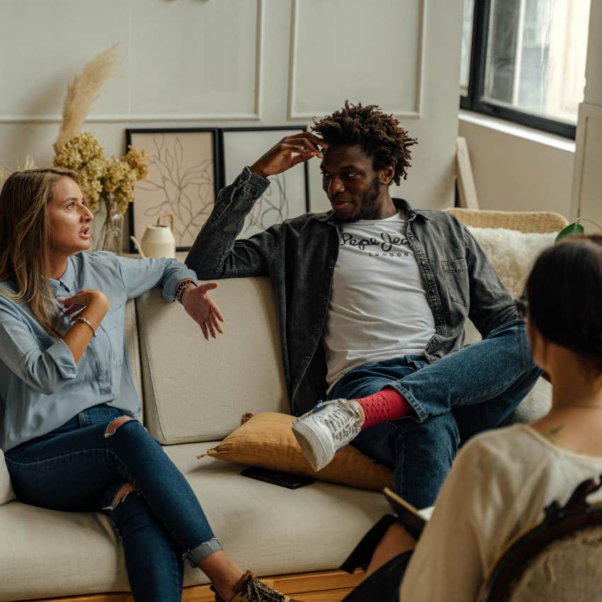 couple turning to a therapist for help