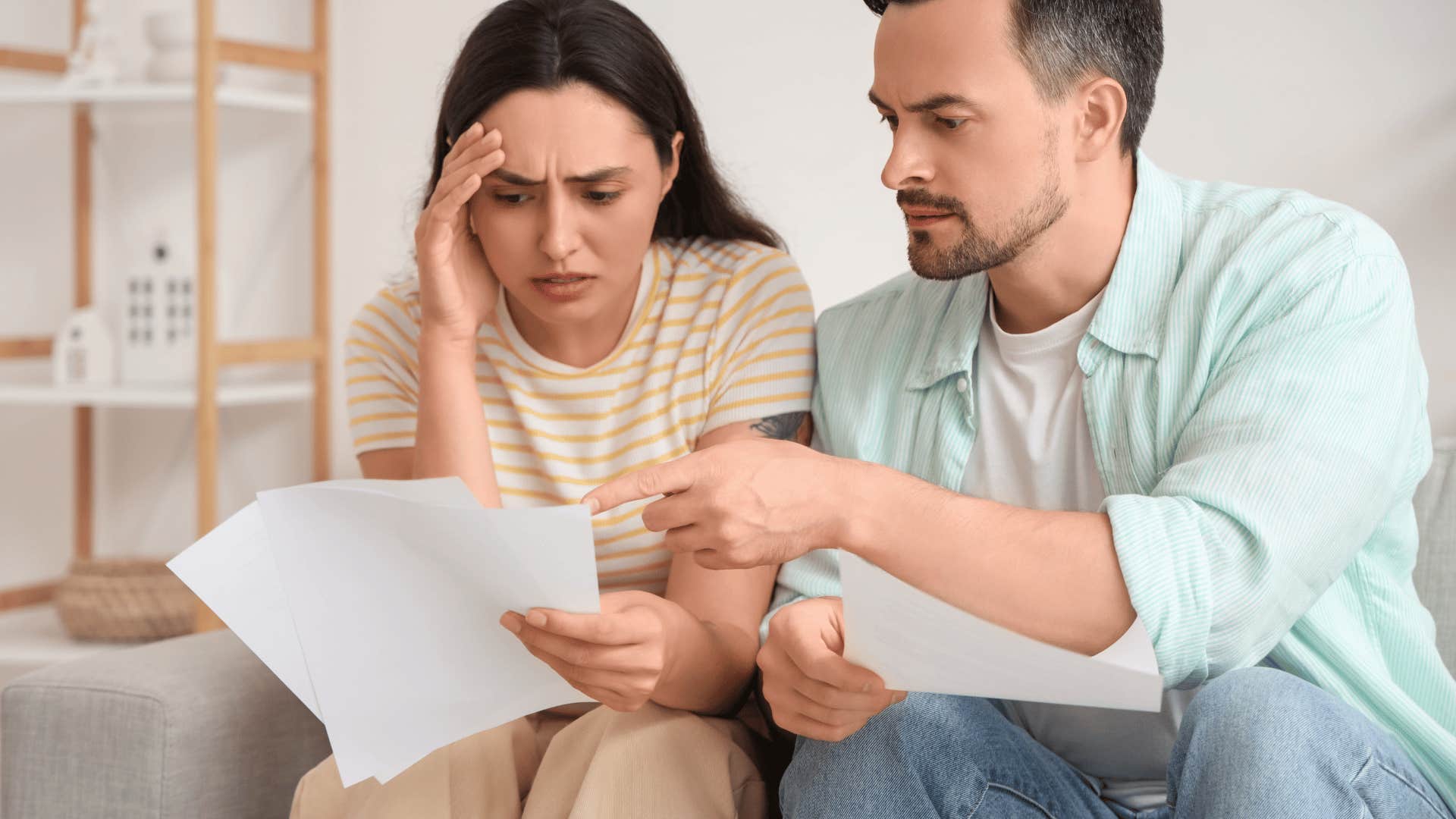 couple choosing a cheaper insurance plan with higher fees
