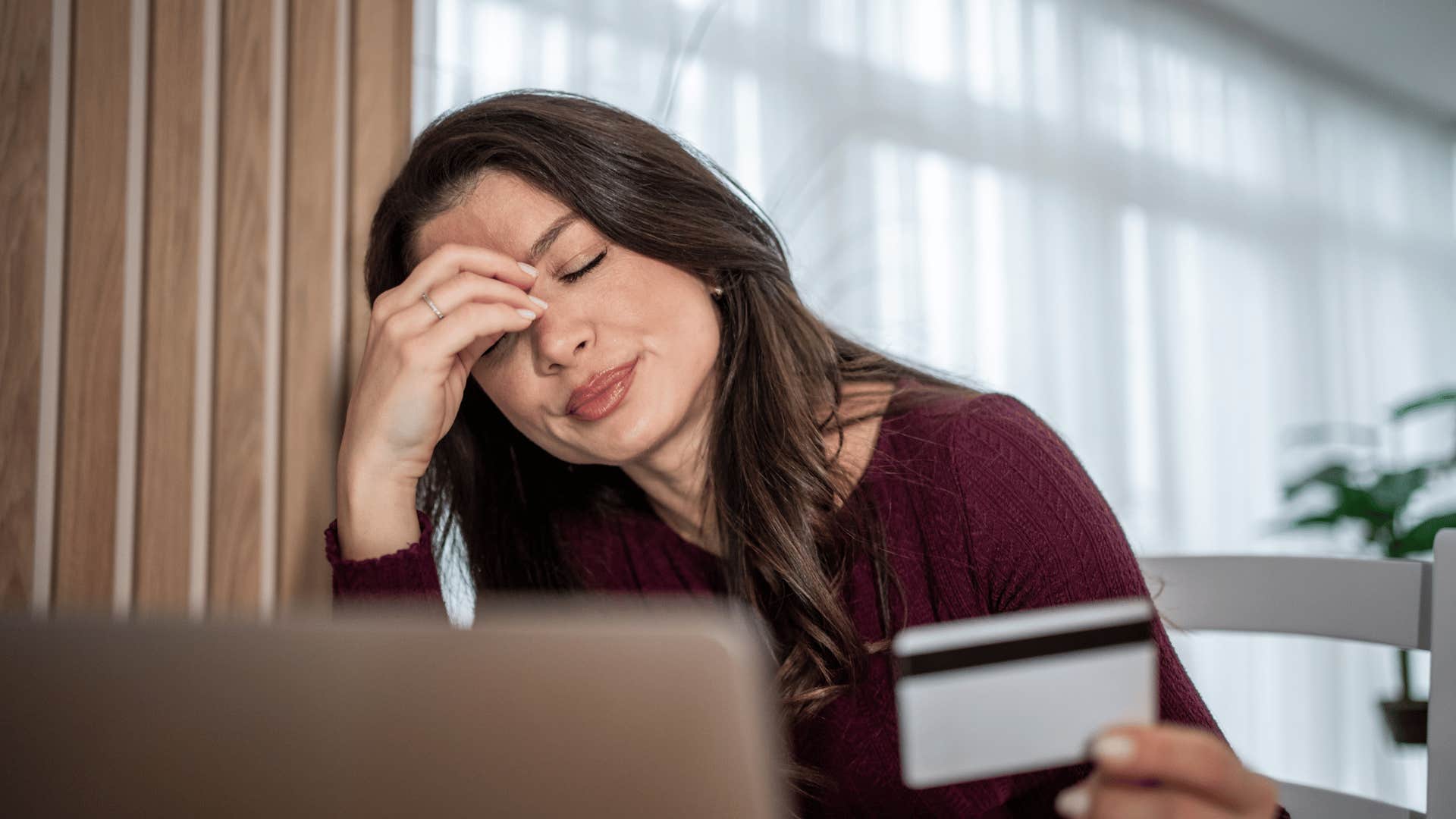 woman letting interest accumulate on her debt