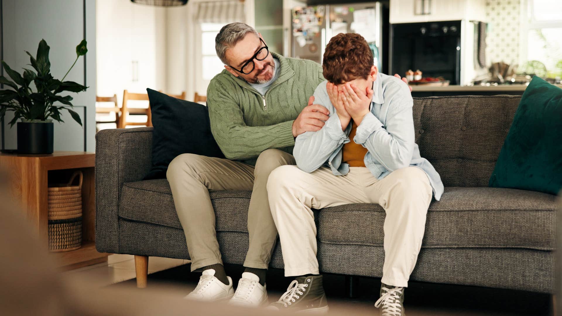high-quality dad teaching teen son to embrace his emotions