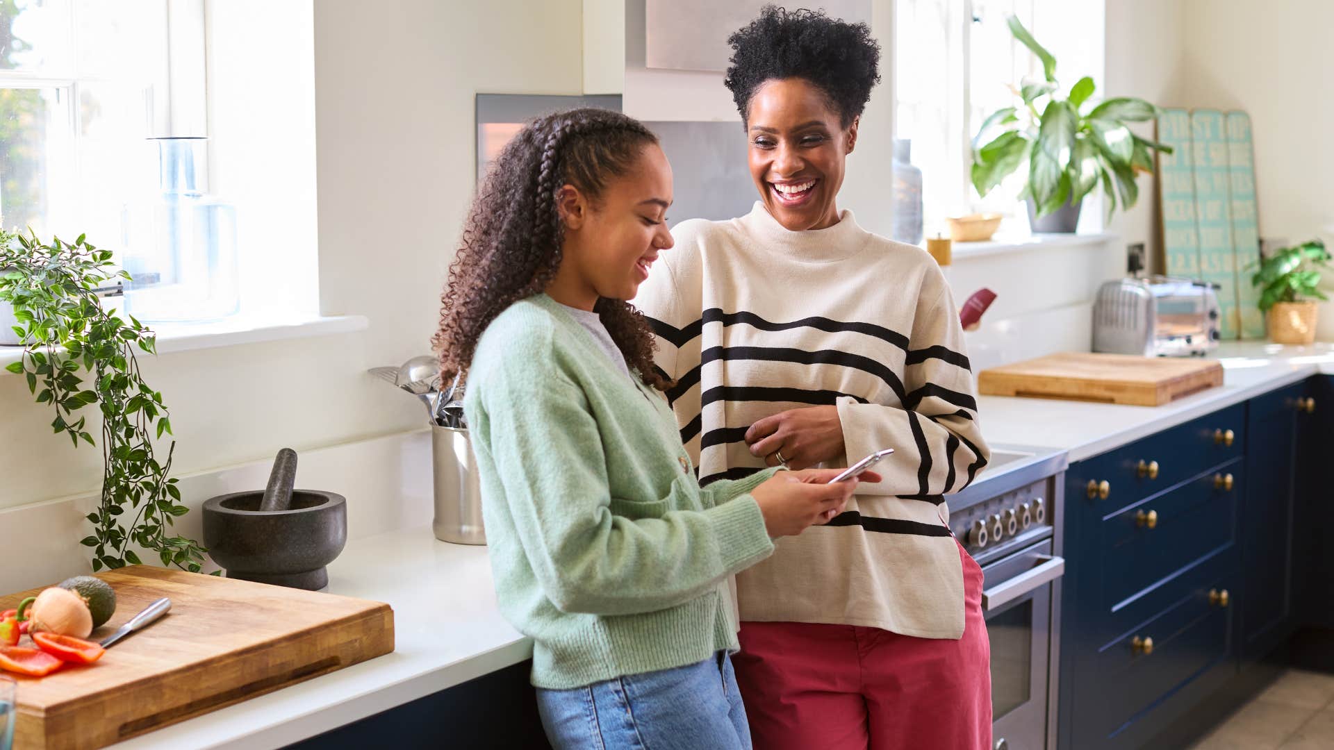high-quality mom teaching teen daughter to value herself