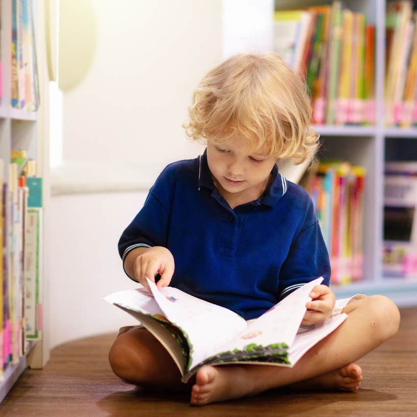 child reading books for fun