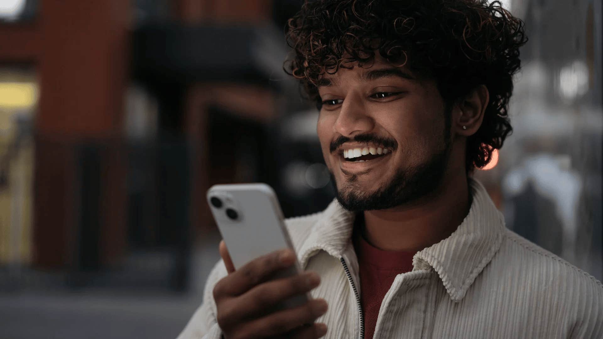 mentally strong man chooses ease by using phone to keep his mind right