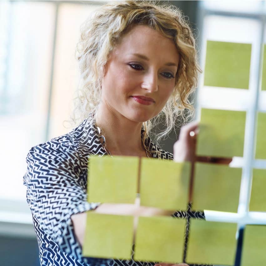 middle aged woman raised without the internet keeping a physical calendar