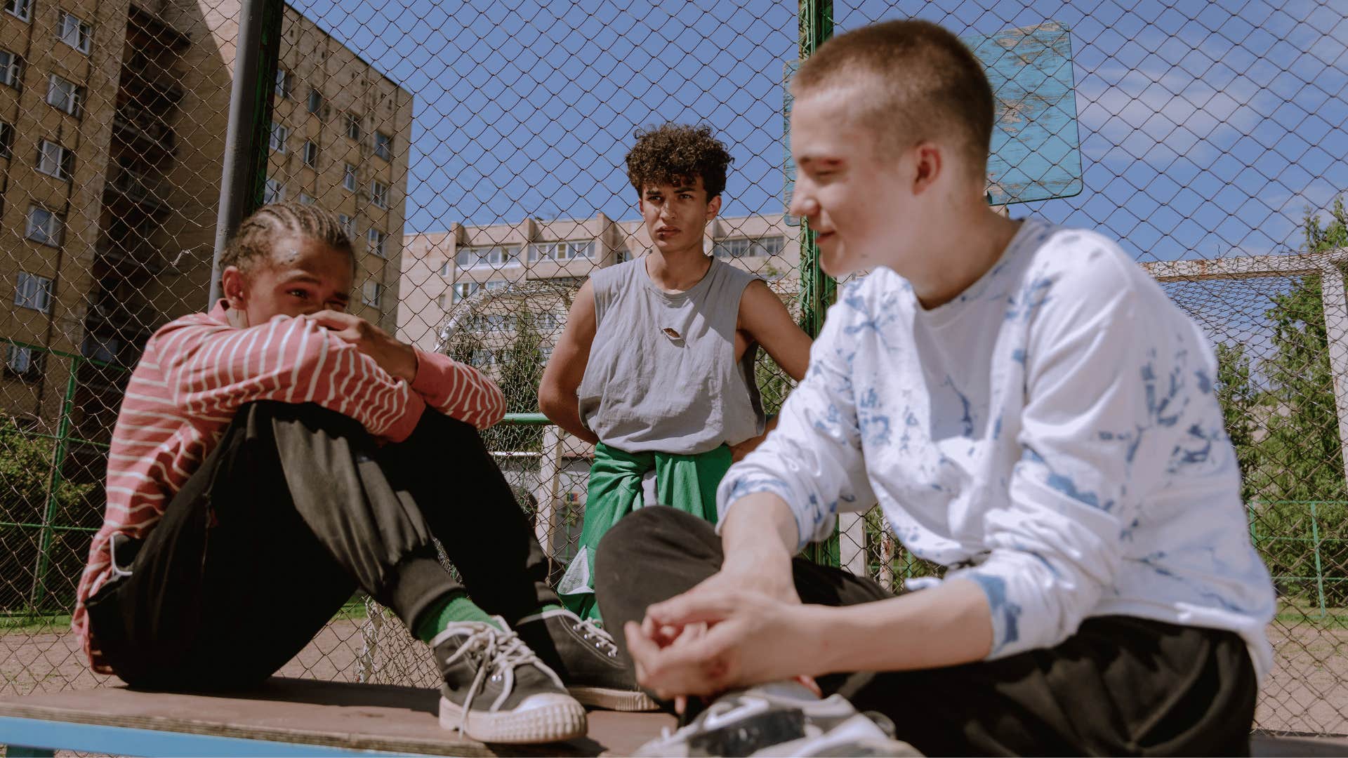 group of boys playing outside by themselves
