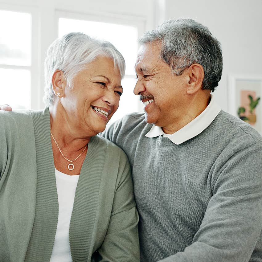 boomer couple in love looking at each other smiling