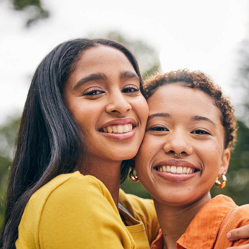 queen gen z couple hugging