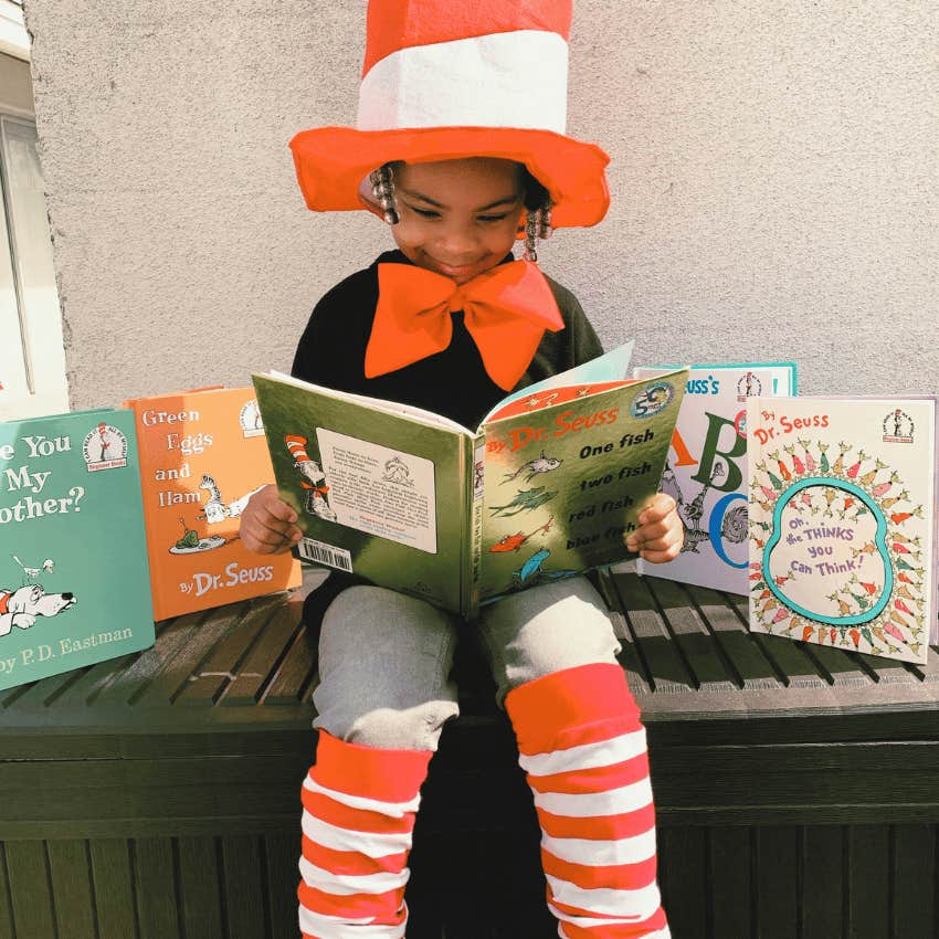 vintage style photo of young girl reading dr. seuss books
