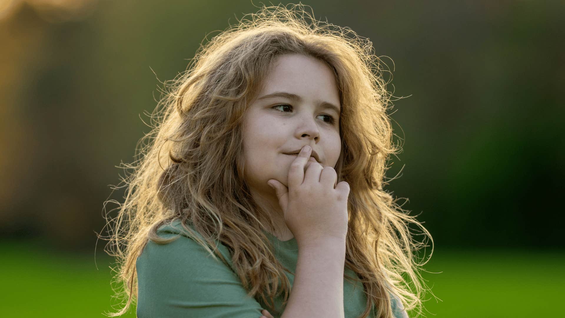 young girl coping with uncertainty thinking by herself