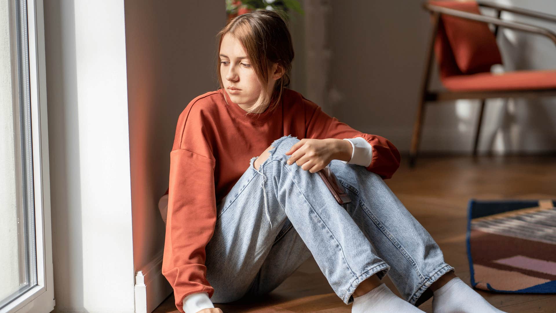 teen girl feeling disappointed at home
