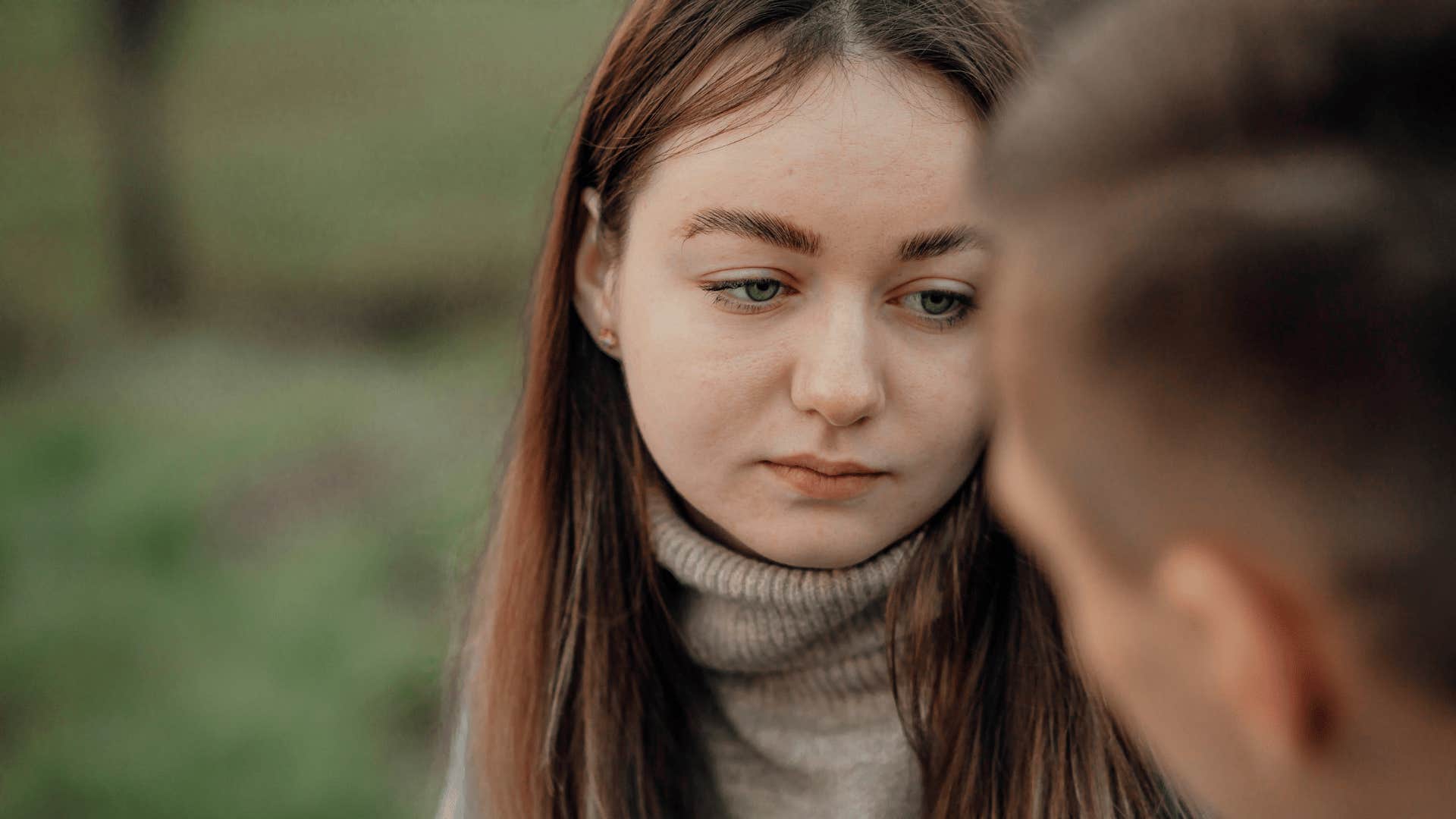 sad depressed woman talking to partner saying i'll be good on my own