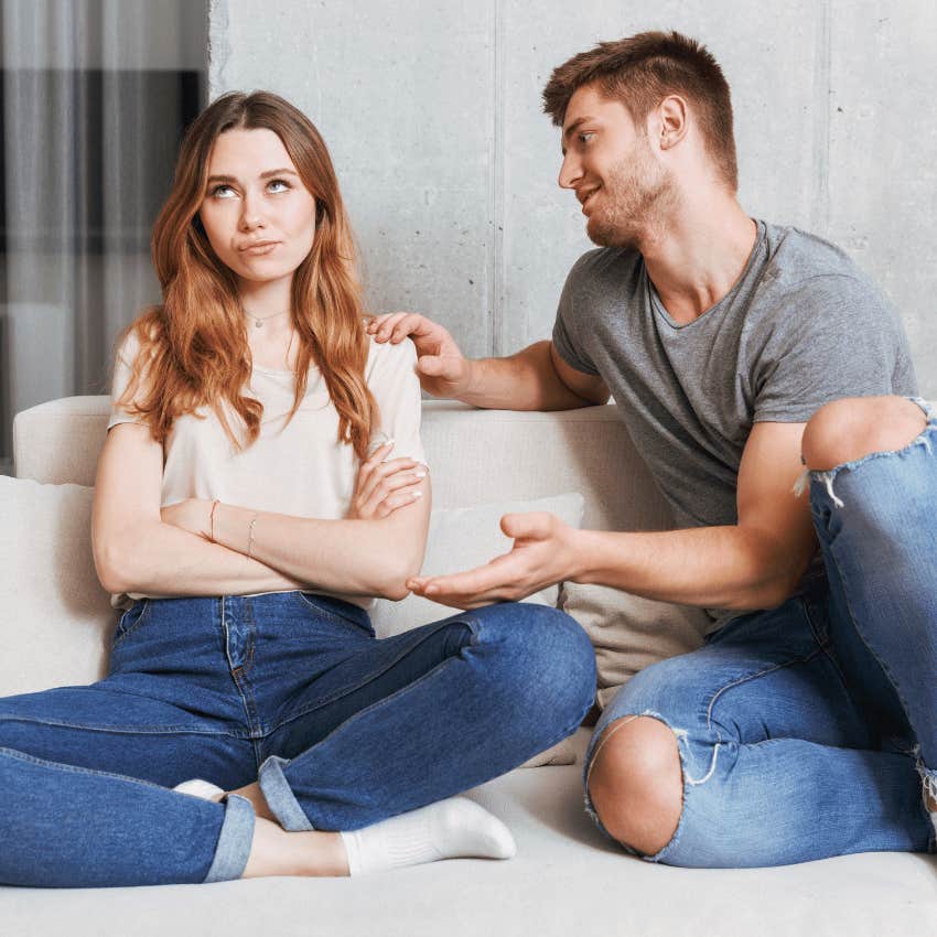 woman rolling her eyes at man