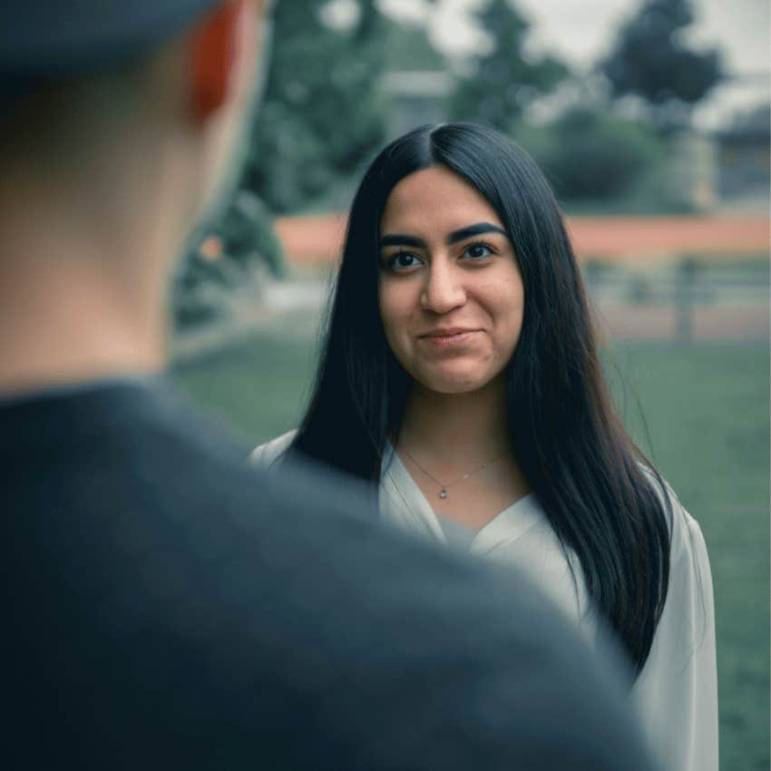 woman smiling softly at man