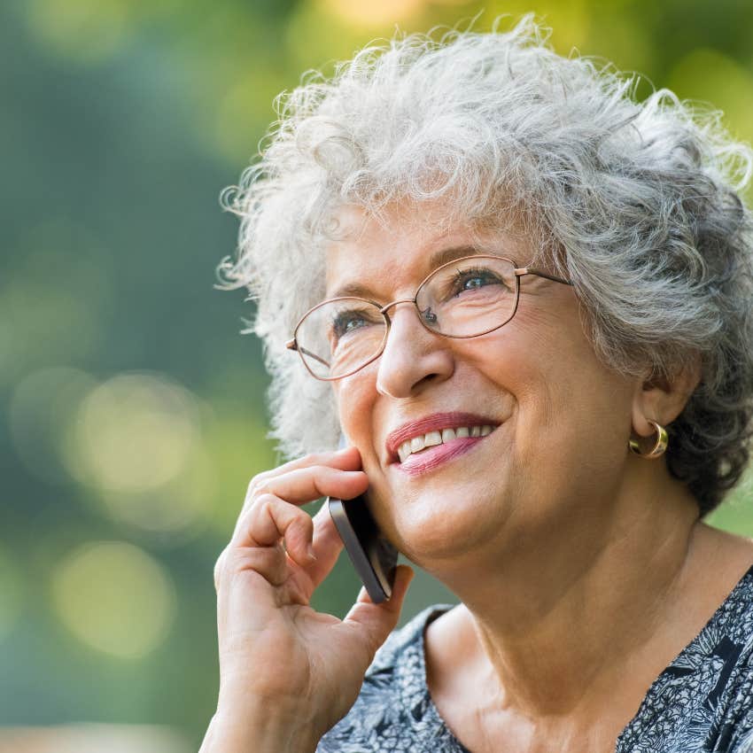 older woman calling friend to keep up with their friendship