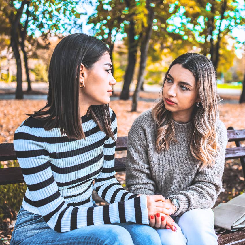 Introverted woman saying "I just need some space" to her friend. 