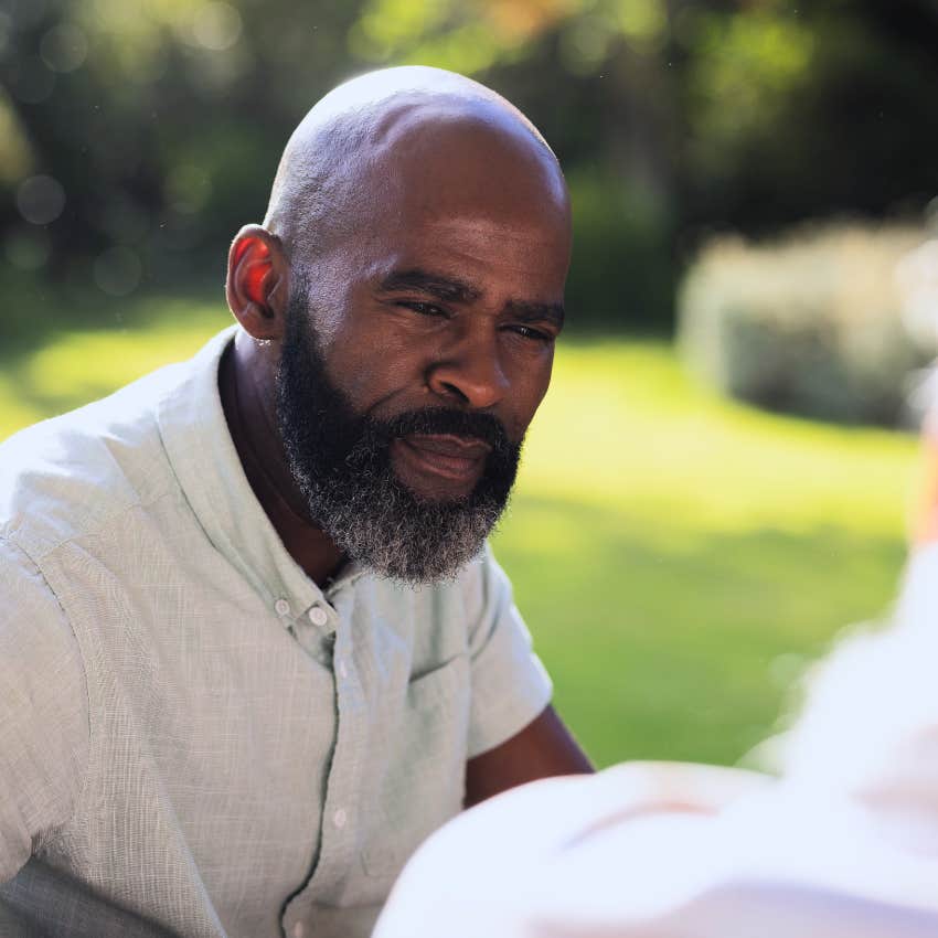 Serious man saying "I'm listening" to a true introvert.
