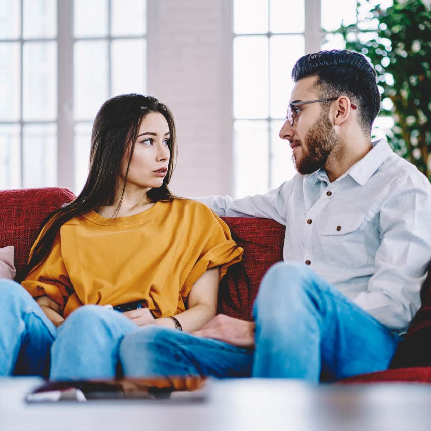 Man who aims to understand listening to his partner at home