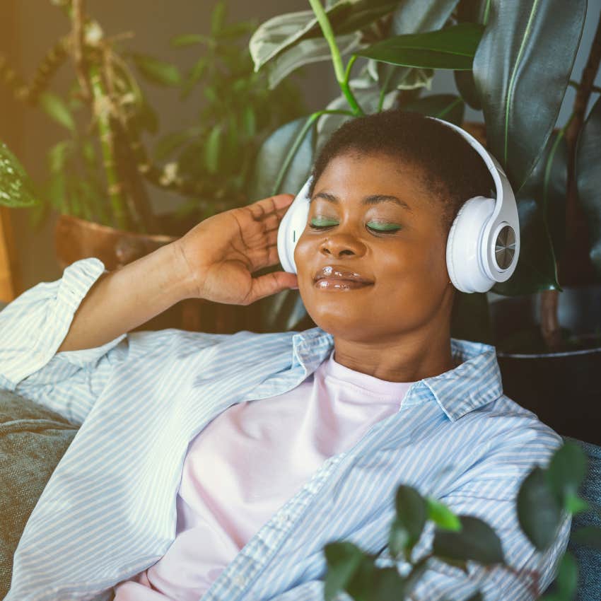 Woman who's learned to let go smiling at home