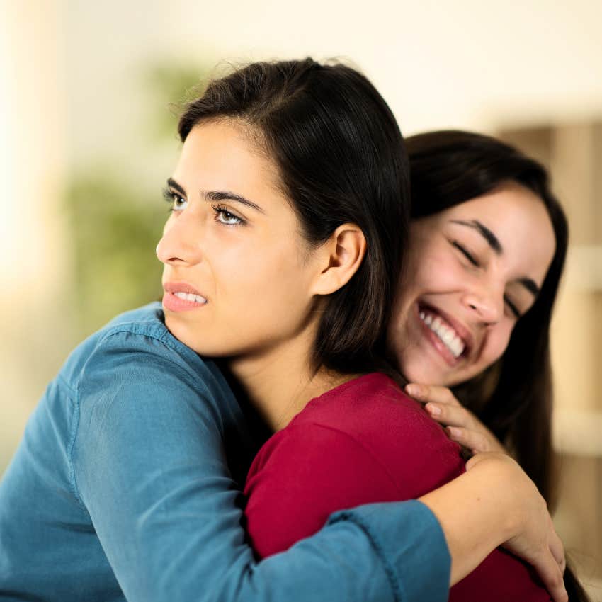 Woman dismissing her friend's success