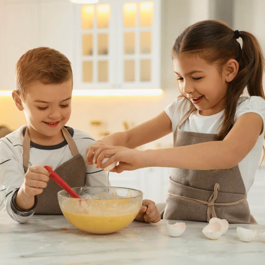 young brother and sister cooking together