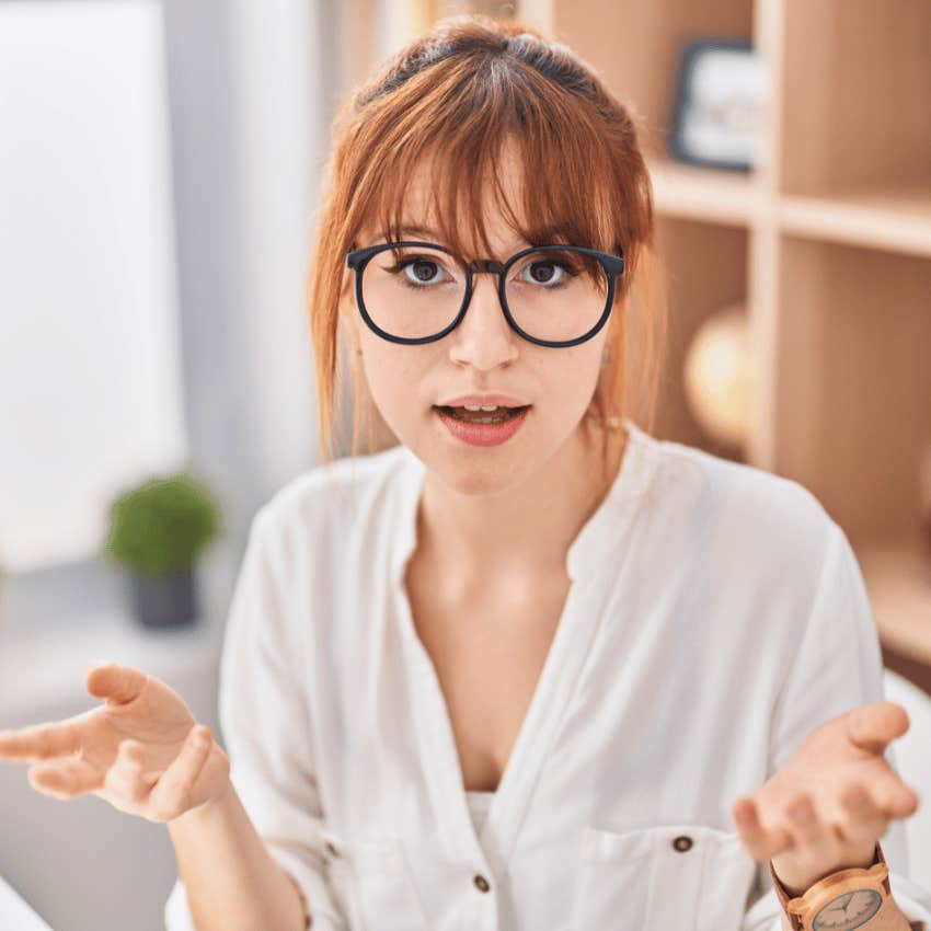 young woman gesturing with her hands expressing her strong boundaries