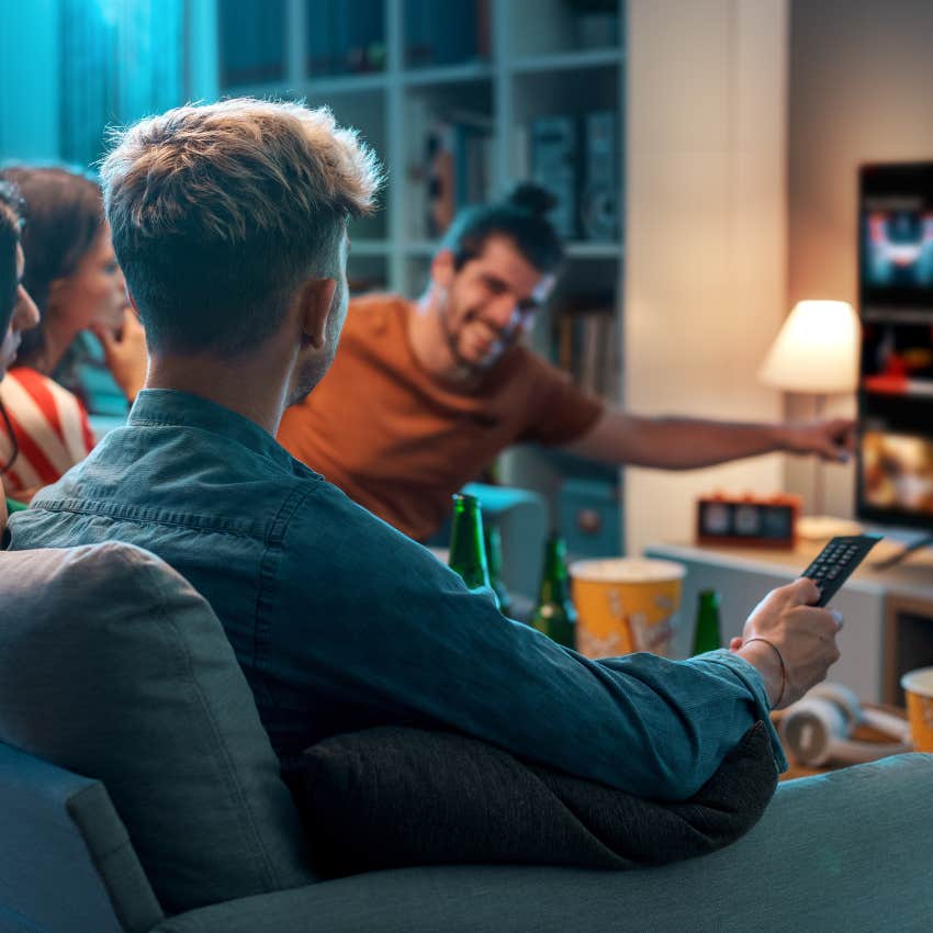 man enjoying company with friends at home