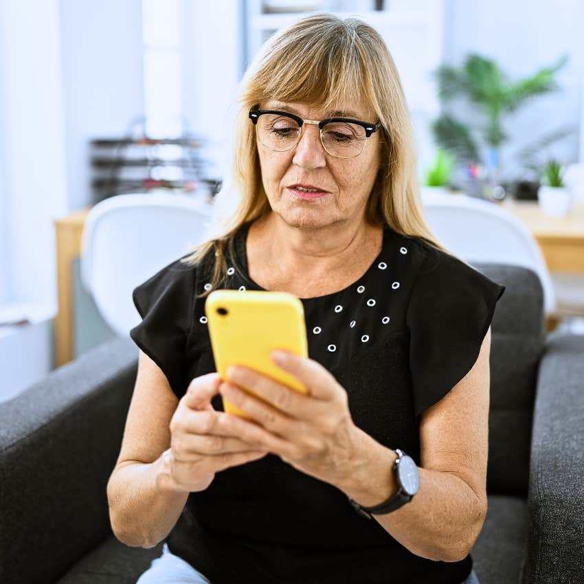 boomer woman texting her adult children asking when they're coming to visit