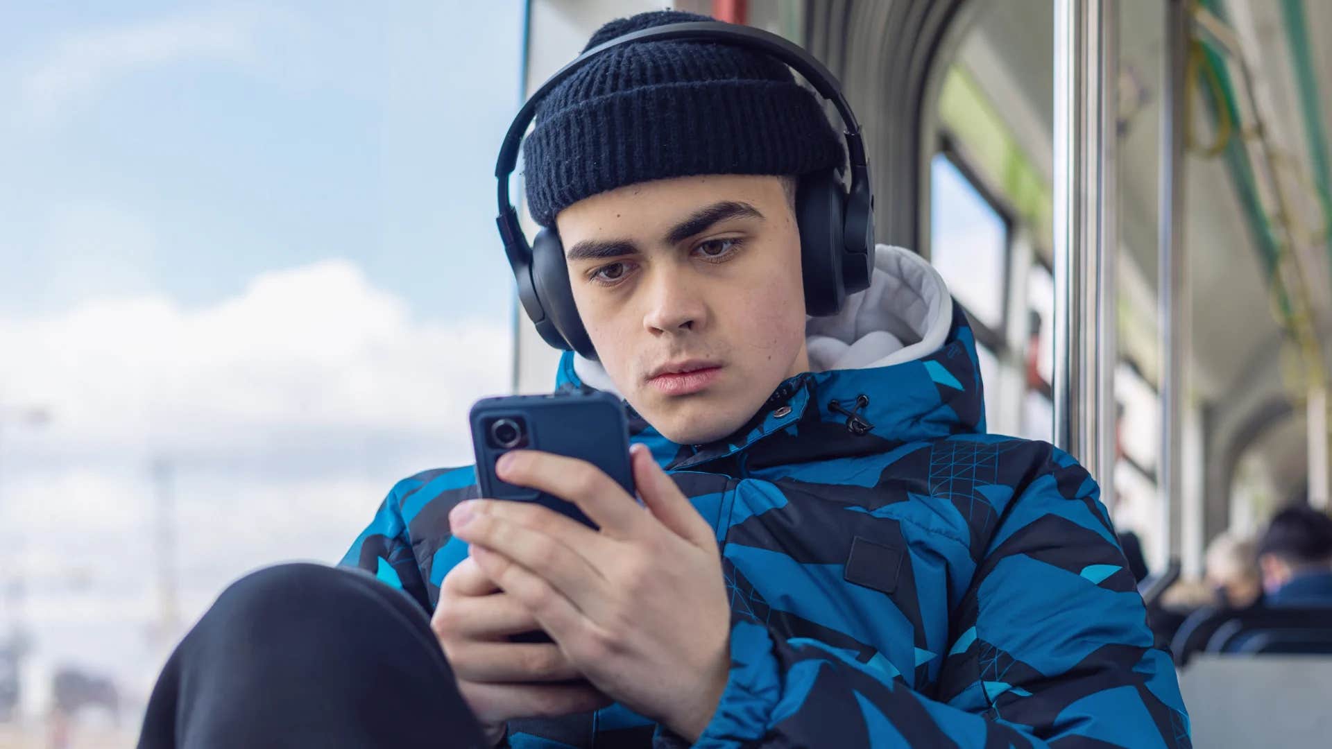 gen Z man being a social activist on his phone