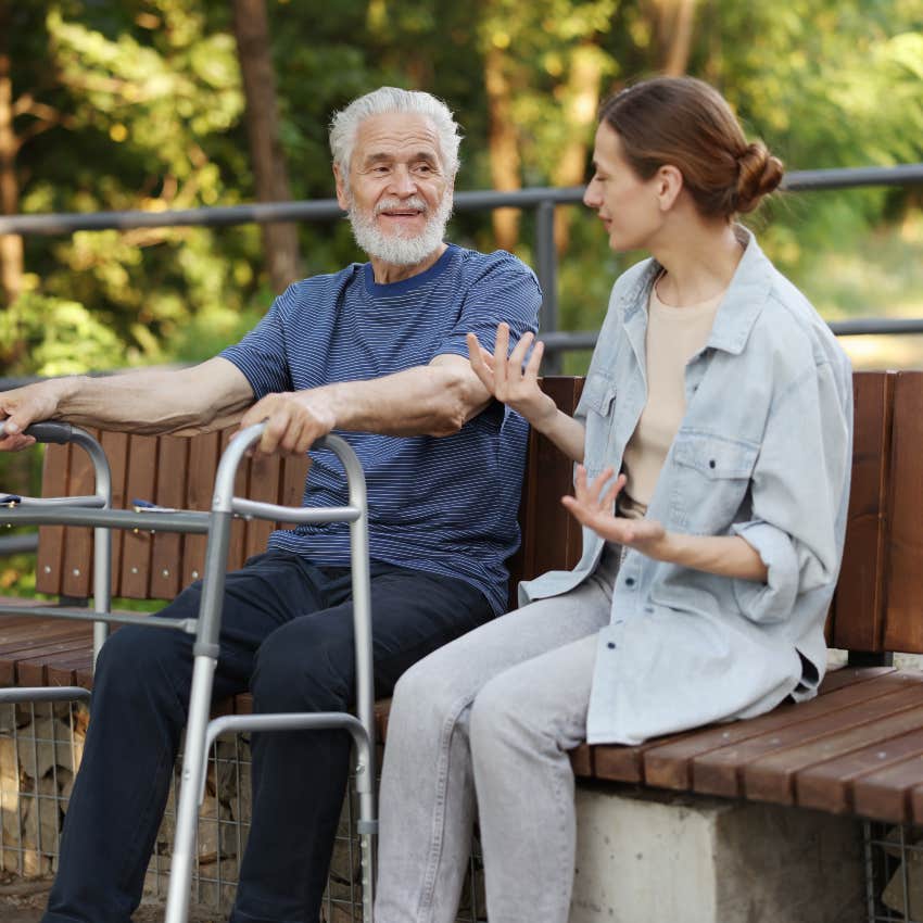 boomer man sitting next to his neighbor chatting