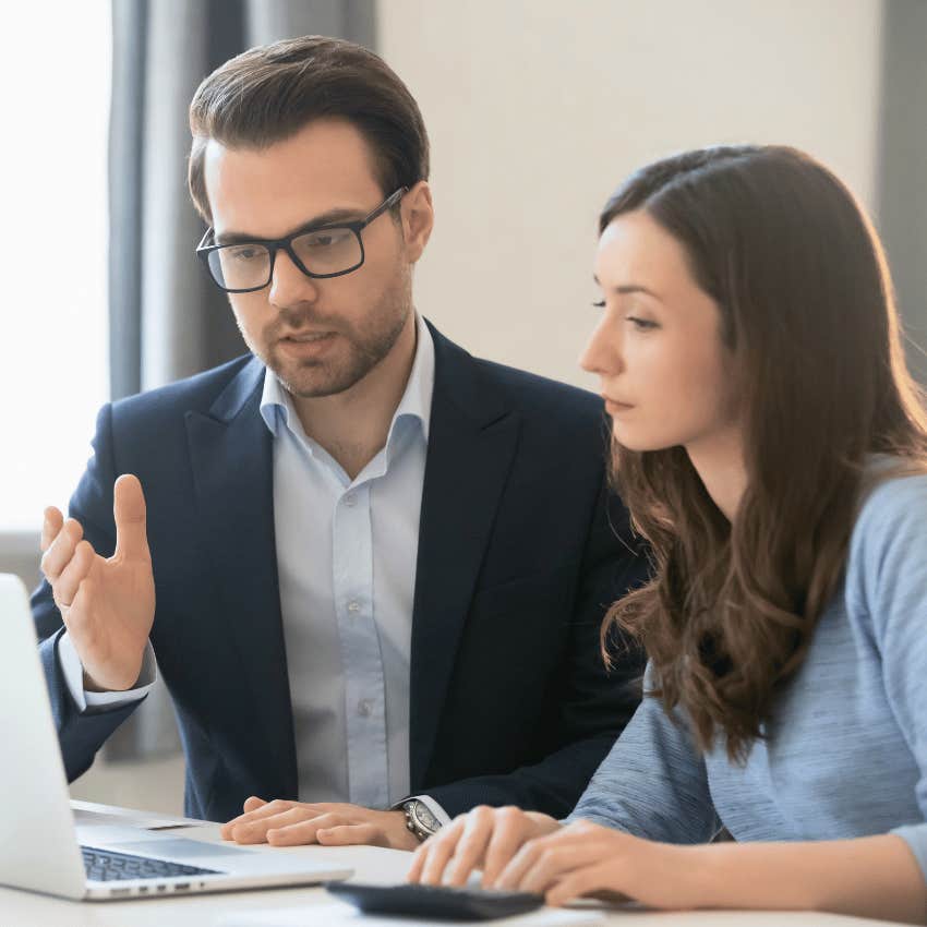 charismatic man offering suggestion to woman