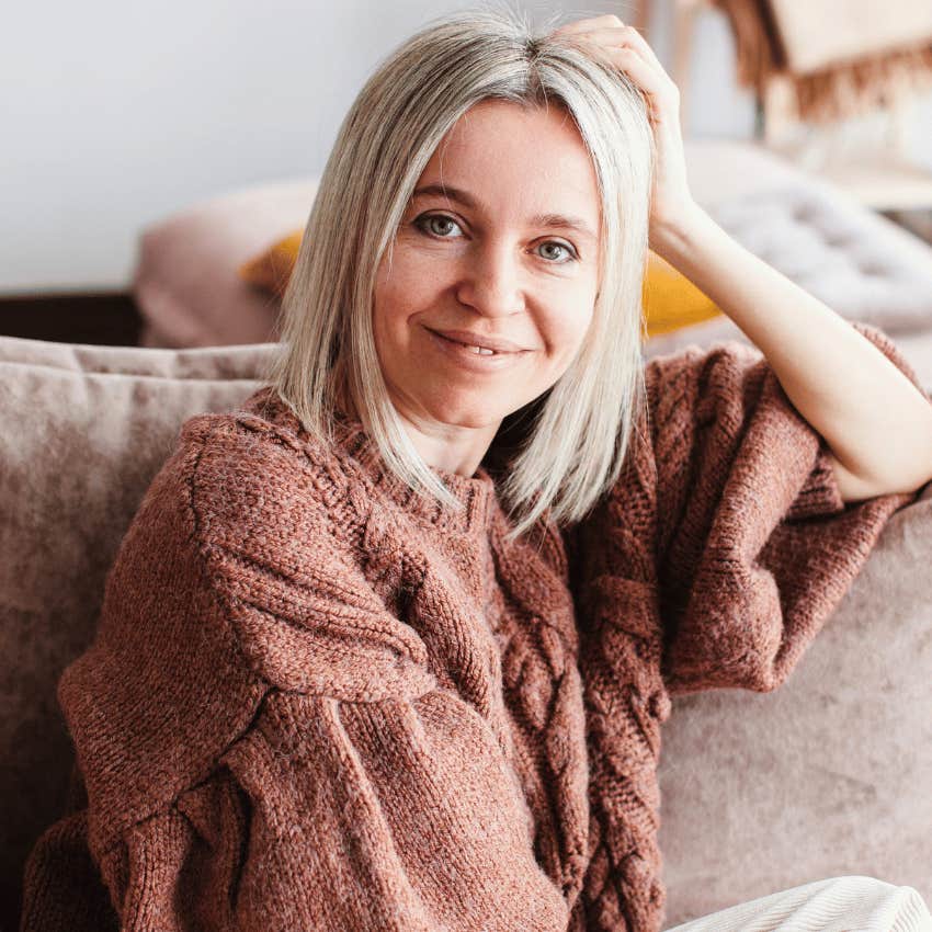 content middle age woman sitting alone