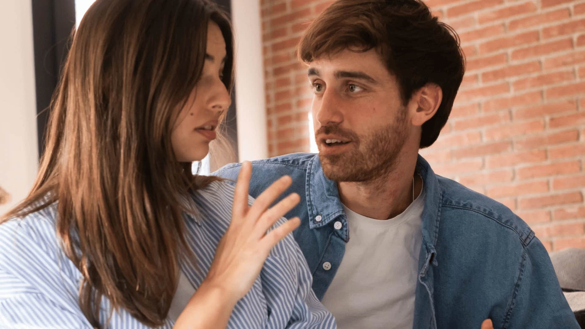 unhappy couple in a discussion about their future