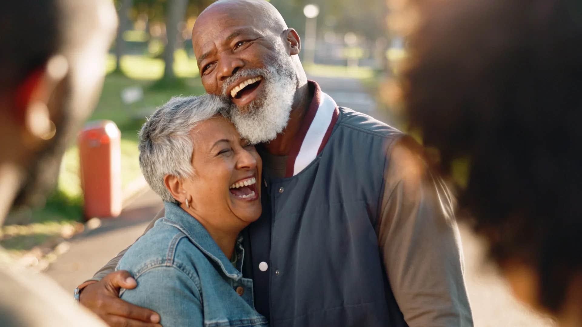 older couple leading with humor and laughing together