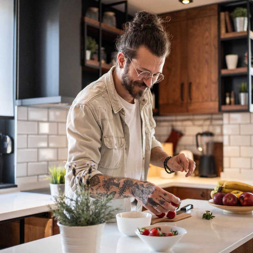 man cooking a meal after work as a hobby