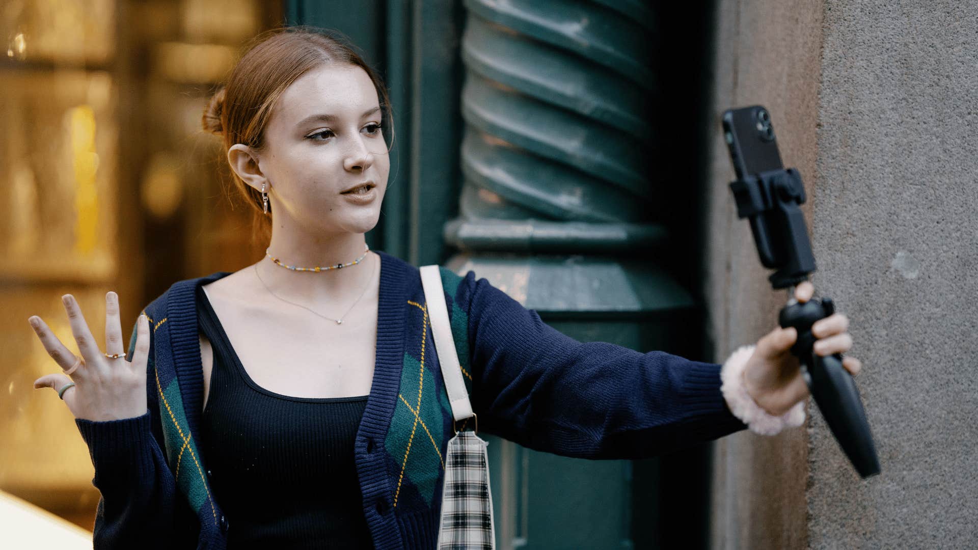 gen Z woman recording herself feeling pressure to monetize everything