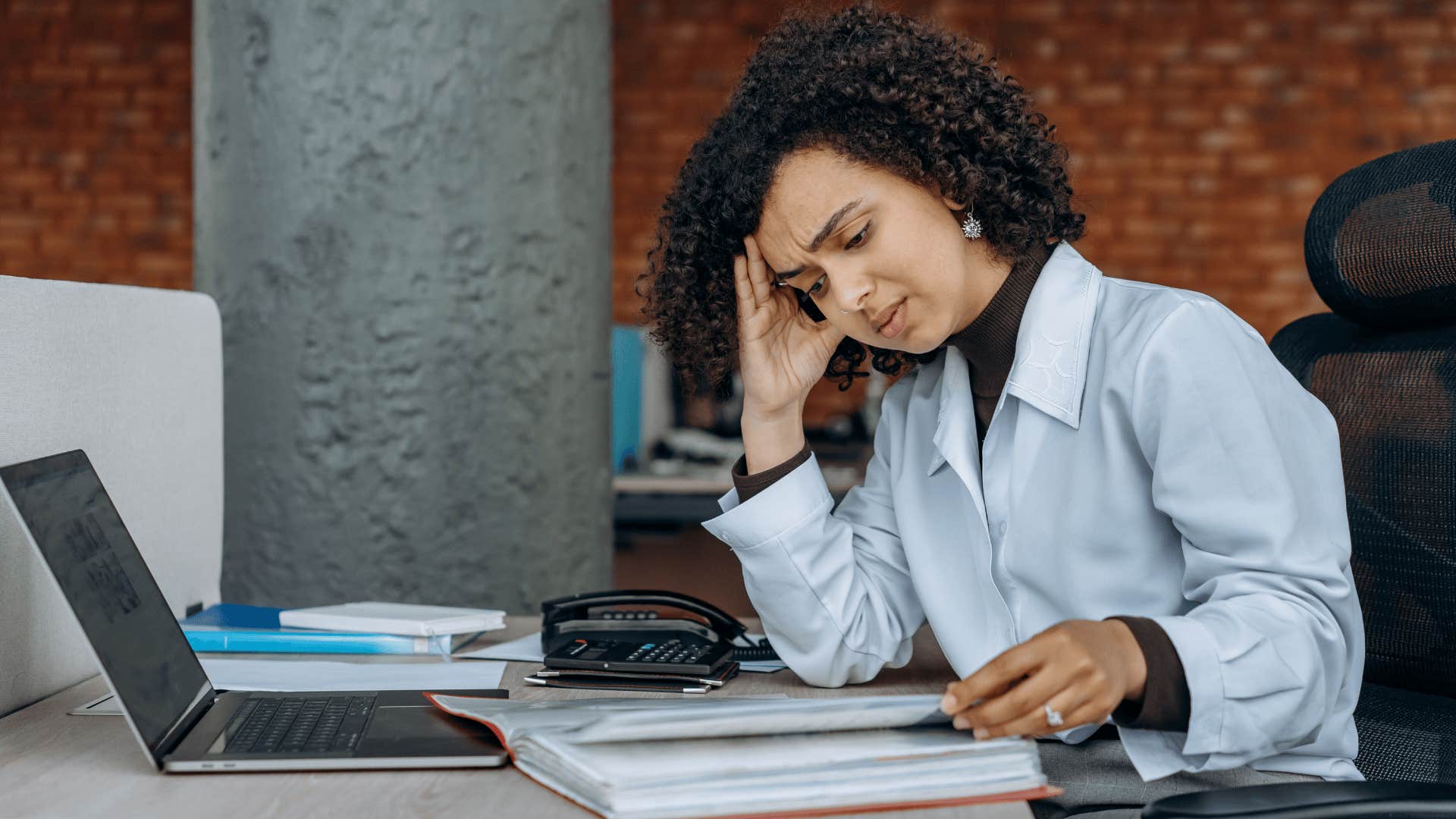 gen z woman feeling burnt out at work