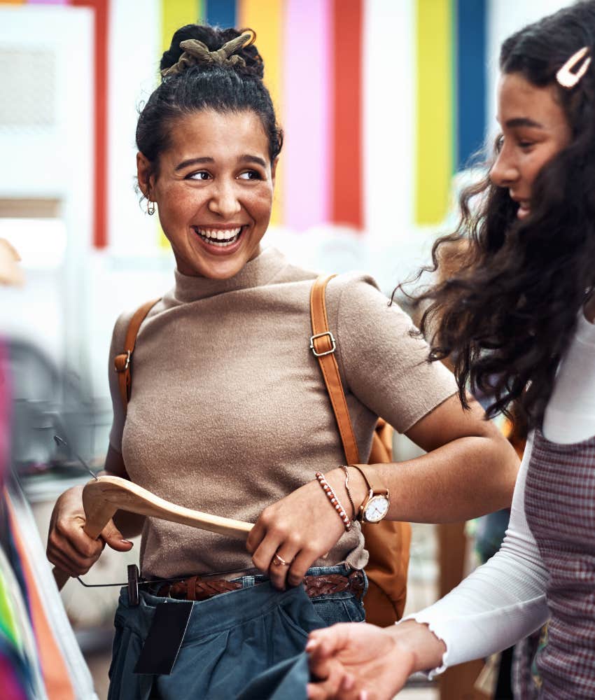 Frugal woman shopping second hand to save money