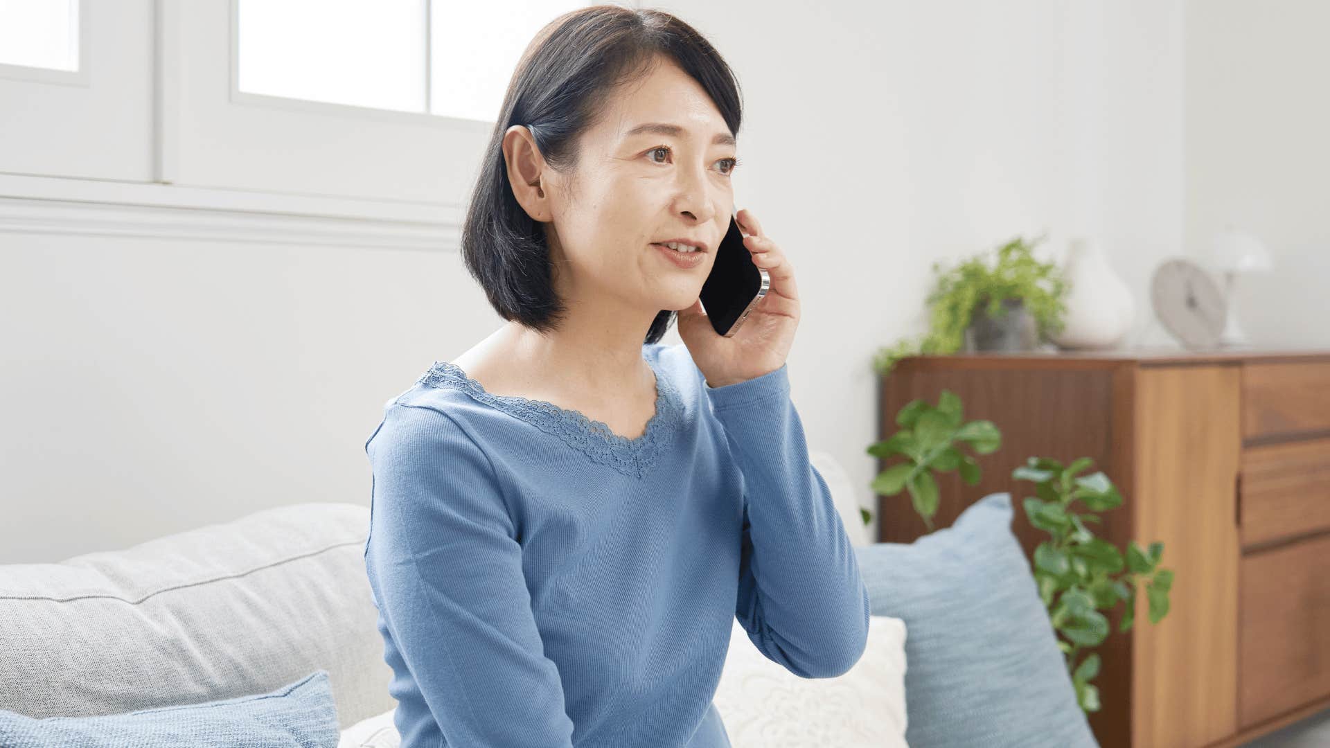 gen X woman on phone asking for alone time